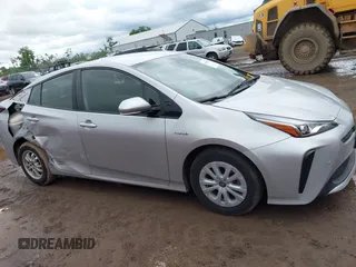 2019 Toyota Prius L Eco z VIN JTDKARFU2K3096560, wystawiony jako IAAI lot #42322950 z przebiegiem 20 866 mil mil oraz . Historia ofert i sprzedaży dostępna na DreamBid. Obrazek 13.