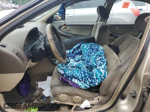 2001 Nissan Maxima GXE with VIN JN1CA31D61T615507, listed as a Copart auction lot 60787575 with Not provided miles and Salvage title. Bid and sale history available at DreamBid. Image 8.