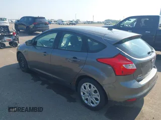 2012 Ford Focus SE z VIN 1FAHP3K21CL347716, wystawiony jako IAAI lot #42415555 z przebiegiem 182 693 mil mil oraz . Historia ofert i sprzedaży dostępna na DreamBid. Obrazek 3.