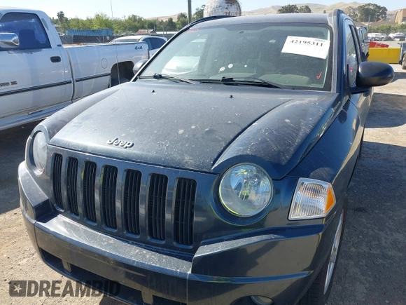 2007 Jeep Compass Sport with VIN 1J8FF47W27D110618, listed as a IAAI auction lot 42195311 with 135,128 mi miles and . Bid and sale history available at carsss.com. Image 6.
