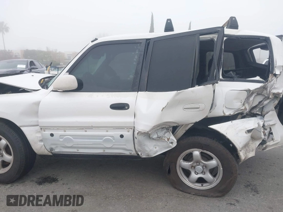 1999 Toyota RAV4 with VIN JT3GP10V0X7050334, listed as a IAAI auction lot 41607894 with 348,069 mi miles and . Bid and sale history available at DreamBid. Image 14.
