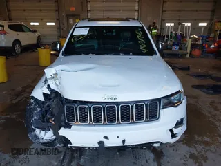 2021 Jeep Grand Cherokee 80th Anniversary with VIN 1C4RJFBG7MC611827, listed as a IAAI auction lot 41631740 with 85,253 mi miles and . Bid and sale history available at DreamBid. Image 13.