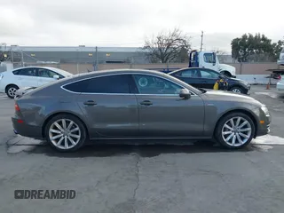 2012 Audi A7 Premium Plus with VIN WAUYGAFC3CN130168, listed as a IAAI auction lot 41647698 with 118,295 mi miles and . Bid and sale history available at DreamBid. Image 13.