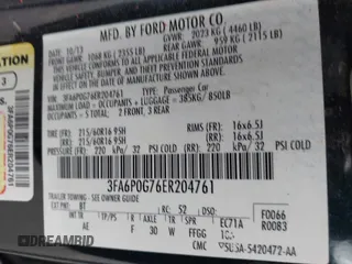 2014 Ford Fusion S with VIN 3FA6P0G76ER204761, listed as a IAAI auction lot 41948590 with 171,605 mi miles and . Bid and sale history available at DreamBid. Image 9.