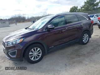 2016 Kia Sorento LX with VIN 5XYPGDA53GG037477, listed as a IAAI auction lot 42048897 with 124,482 mi miles and . Bid and sale history available at DreamBid. Image 2.