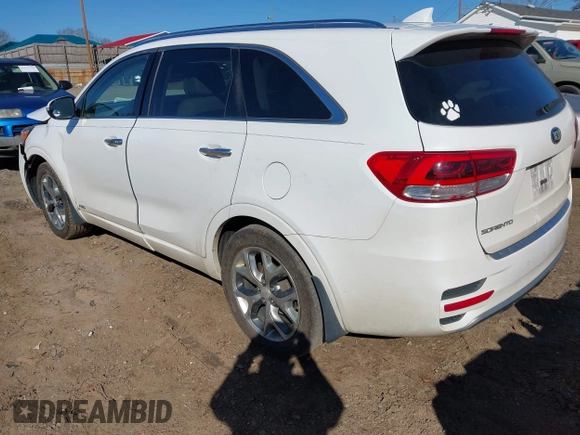 2016 Kia Sorento SX with VIN 5XYPKDA55GG174984, listed as a IAAI auction lot 41216303 with 142,875 mi miles. Bid and sale history available at carsss.com. Image 3.