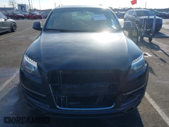 2014 Audi Q7 Premium Plus z VIN WA1LMAFE7ED012604, wystawiony jako IAAI lot #41526909 z przebiegiem 102 187 mil mil oraz . Historia ofert i sprzedaży dostępna na DreamBid. Obrazek 6.