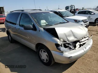 2000 Toyota Sienna LE with VIN 4T3ZF13C3YU229328, listed as a Copart auction lot 70880244 with 201,464 mi miles and Salvage Title. Bid and sale history available at carsss.com. Image 4.
