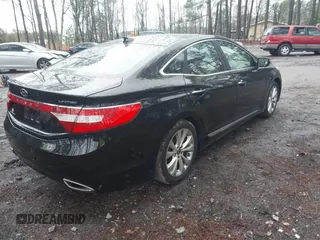 2014 Hyundai Azera Limited with VIN KMHFH4JG3EA376873, listed as a IAAI auction lot 41530698 with 94,263 mi miles and . Bid and sale history available at DreamBid. Image 4.