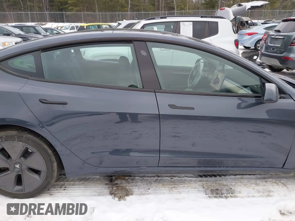 2023 Tesla Model 3 Long Range with VIN 5YJ3E1EBXPF708122, listed as a IAAI auction lot 41185314 with 27,765 mi miles and . Bid and sale history available at DreamBid. Image 13.