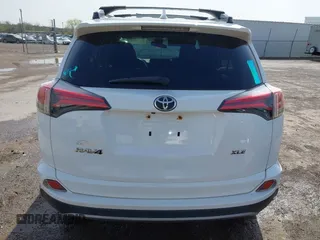 2017 Toyota RAV4 XLE with VIN 2T3WFREV3HW324973, listed as a IAAI auction lot 41778641 with 113,617 mi miles and . Bid and sale history available at DreamBid. Image 16.