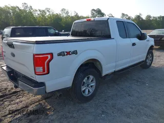 2016 Ford F-150 XLT with VIN 1FTFX1EF4GKE50550, listed as a IAAI auction lot 41974498 with 154,409 mi miles. Bid and sale history available at carsss.com. Image 4.