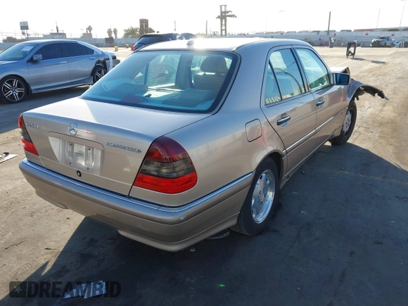 2000 Mercedes-Benz C 230 Kompressor with VIN WDBHA24G9YA856825, listed as a IAAI auction lot 41418925 with 99,616 mi miles and . Bid and sale history available at carsss.com. Image 4.