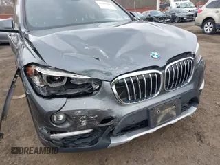 2017 BMW X1 xDrive28i with VIN WBXHT3C35H5F74213, listed as a IAAI auction lot 41589180 with 58,990 mi miles. Bid and sale history available at carsss.com. Image 6.