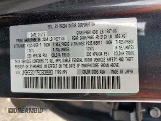2014 Mazda CX-5 Touring z VIN JM3KE2CY7E0308580, wystawiony jako Copart lot #60565835 z przebiegiem 92 708 mil mil oraz Szkoda całkowita • Salvage title. Historia ofert i sprzedaży dostępna na DreamBid. Obrazek 13.