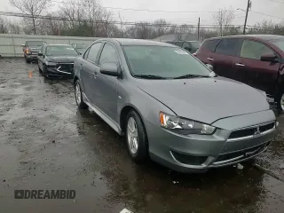 2014 Mitsubishi Lancer SE z VIN JA32V2FW8EU020237, wystawiony jako Copart lot #50333595 z przebiegiem 128 289 mil mil oraz Szkoda całkowita • Salvage title. Historia ofert i sprzedaży dostępna na DreamBid. Obrazek 11.