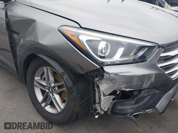 2018 Hyundai Santa Fe 2.4L with VIN 5XYZT3LB7JG569517, listed as a IAAI auction lot 42141100 with 57,854 mi miles and . Bid and sale history available at DreamBid. Image 6.