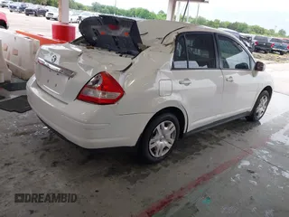 2010 Nissan Versa S с VIN 3N1BC1AP8AL391813, выставлен на аукционе IAAI как лот 42224883 с пробегом 103 839 миль миль и . История ставок и продаж доступна на DreamBid. Изображение 4.