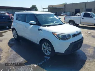 2014 Kia Soul + with VIN KNDJP3A58E7036528, listed as a IAAI auction lot 42014997 with 156,853 mi miles. Bid and sale history available at carsss.com. Image 1.