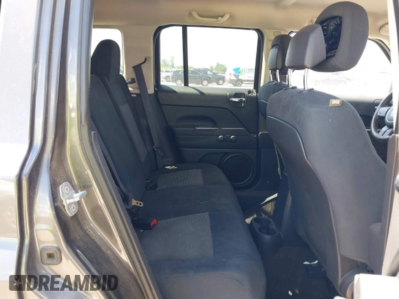 2014 Jeep Patriot Altitude with VIN 1C4NJPBA4ED786063, listed as a IAAI auction lot 42174337 with 96,398 mi miles and . Bid and sale history available at DreamBid. Image 8.