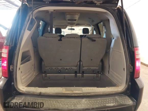 2008 Dodge Grand Caravan SXT with VIN 1D8HN54PX8B107647, listed as a IAAI auction lot 40763240 with 225,351 mi miles and . Bid and sale history available at DreamBid. Image 18.