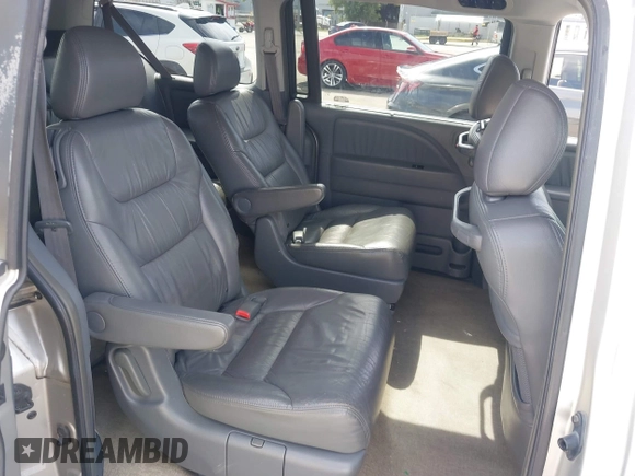 2006 Honda Odyssey EX-L z VIN 5FNRL38736B089963, wystawiony jako IAAI lot #41858061 z przebiegiem 178 845 mil mil oraz . Historia ofert i sprzedaży dostępna na DreamBid. Obrazek 8.