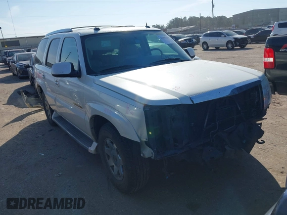 2005 Cadillac Escalade z VIN 1GYEC63TX5R114526, wystawiony jako IAAI lot #41685638 z przebiegiem 167 048 mil mil oraz . Historia ofert i sprzedaży dostępna na DreamBid. Obrazek 1.