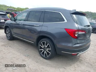 2020 Honda Pilot Elite with VIN 5FNYF6H00LB027472, listed as a IAAI auction lot 42253478 with 69,988 mi miles and . Bid and sale history available at DreamBid. Image 3.