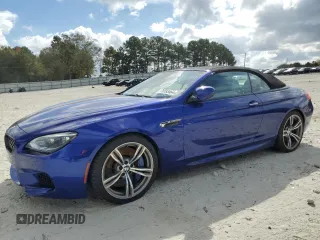 2012 BMW M6 z VIN WBSLZ9C5XCC985501, wystawiony jako Copart lot #78783464 z przebiegiem 80 961 mil mil oraz Czysty tytuł • Clean title. Historia ofert i sprzedaży dostępna na DreamBid. Obrazek 1.