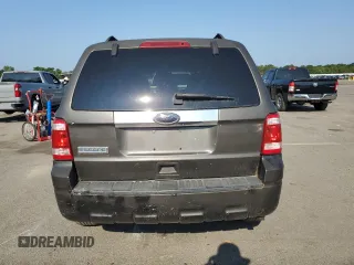 2011 Ford Escape Hybrid with VIN 1FMCU4K35BKA16469, listed as a Copart auction lot 65811905 with 401,583 mi miles and Clean title. Bid and sale history available at DreamBid. Image 6.