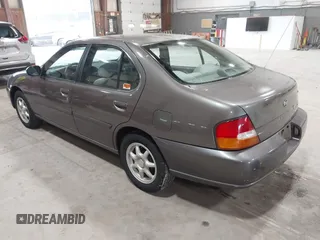 1998 Nissan Altima XE with VIN 1N4DL01D9WC181624, listed as a IAAI auction lot 42222694 with 155,391 mi miles and . Bid and sale history available at carsss.com. Image 3.
