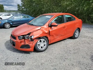 2012 Chevrolet Sonic LT z VIN 1G1JD5SB3C4231033, wystawiony jako Copart lot #56145205 z przebiegiem 43 015 mil mil oraz Szkoda całkowita • Salvage title. Historia ofert i sprzedaży dostępna na DreamBid. Obrazek 1.