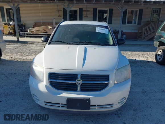 2009 Dodge Caliber SXT with VIN 1B3HB48A39D233105, listed as a IAAI auction lot 41872576 with Not Provided miles and . Bid and sale history available at DreamBid. Image 6.