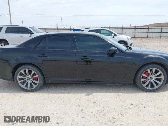2014 Chrysler 300 S with VIN 2C3CCABG8EH376795, listed as a IAAI auction lot 42038260 with 134,265 mi miles and . Bid and sale history available at carsss.com. Image 13.