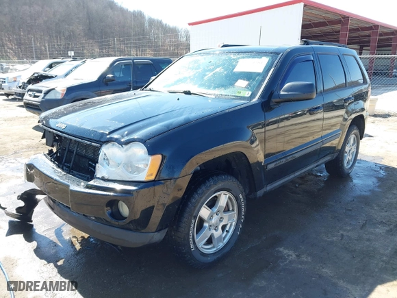 2007 Jeep Grand Cherokee Laredo with VIN 1J8GR48K67C523705, listed as a IAAI auction lot 41774281 with 215,572 mi miles. Bid and sale history available at carsss.com. Image 21.