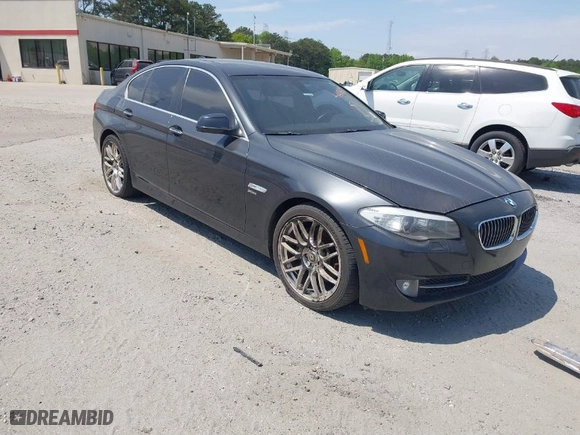 2011 BMW 5 Series 535i xDrive with VIN WBAFU7C58BC877235, listed as a IAAI auction lot 41684559 with 130,465 mi miles. Bid and sale history available at carsss.com. Image 1.
