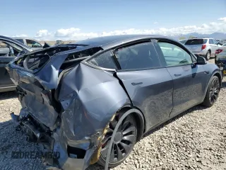 2022 Tesla Model Y Performance with VIN 7SAYGDEF1NF466938, listed as a Copart auction lot 53678045 with 50,135 mi miles and Salvage Title. Bid and sale history available at DreamBid. Image 3.