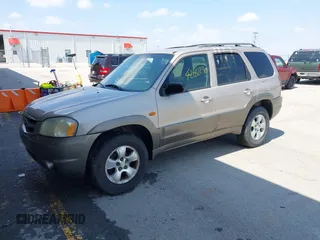 2002 Mazda Tribute LX with VIN 4F2YU08132KM26681, listed as a IAAI auction lot 42032230 with 273,155 mi miles and . Bid and sale history available at DreamBid. Image 2.