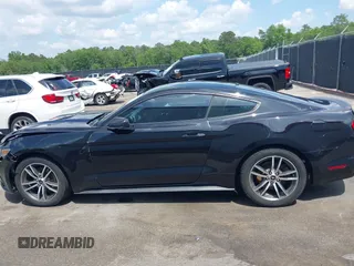 2016 Ford Mustang EcoBoost z VIN 1FA6P8TH2G5276754, wystawiony jako IAAI lot #42157727 z przebiegiem 71 174 mil mil oraz . Historia ofert i sprzedaży dostępna na DreamBid. Obrazek 14.