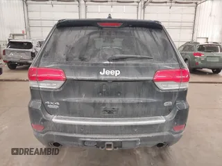 2014 Jeep Grand Cherokee Overland with VIN 1C4RJFCG8EC177899, listed as a IAAI auction lot 41695290 with 200,867 mi miles and . Bid and sale history available at DreamBid. Image 17.