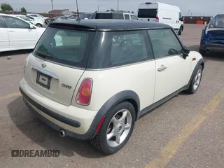 2004 MINI Hardtop with VIN WMWRC334X4TJ56384, listed as a IAAI auction lot 42581423 with 79,129 mi miles and . Bid and sale history available at DreamBid. Image 4.