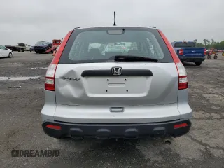 2009 Honda CR-V LX с VIN 5J6RE48329L020917, выставлен на аукционе Copart как лот 61266295 с пробегом 128 560 миль миль и Списание • Salvage title. История ставок и продаж доступна на DreamBid. Изображение 6.
