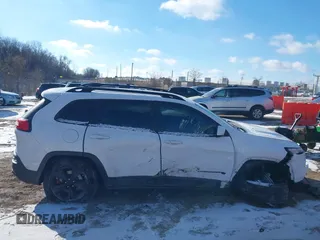 2015 Jeep Cherokee North with VIN 1C4PJMCS7FW792850, listed as a IAAI auction lot 41323432 with 102,642 mi miles. Bid and sale history available at carsss.com. Image 13.