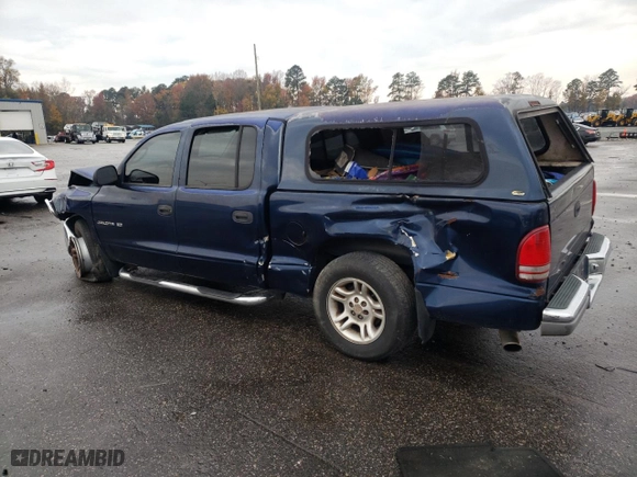 2001 Dodge Dakota Sport with VIN 1B7HL2AN41S258253, listed as a Copart auction lot 82574434 with 0 mi miles and Salvage Title. Bid and sale history available at carsss.com. Image 2.