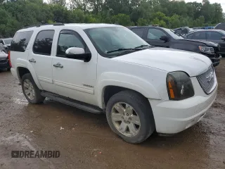 2011 GMC Yukon SLT z VIN 1GKS2CE00BR150352, wystawiony jako Copart lot #61031085 z przebiegiem 258 142 mil mil oraz Czysty tytuł • Clean title. Historia ofert i sprzedaży dostępna na DreamBid. Obrazek 4.