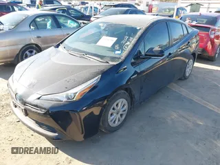 2020 Toyota Prius L Eco with VIN JTDKARFU1L3114502, listed as a IAAI auction lot 41134750 with 62,222 mi miles and . Bid and sale history available at DreamBid. Image 2.