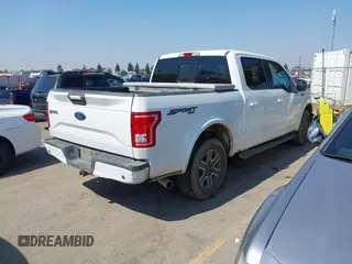 2015 Ford F-150 XLT with VIN 1FTEW1EP0FFA16253, listed as a IAAI auction lot 41852006 with 313,018 mi miles. Bid and sale history available at carsss.com. Image 4.
