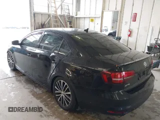 2016 Volkswagen Jetta Sport z VIN 3VWD17AJ0GM283938, wystawiony jako IAAI lot #41861923 z przebiegiem 118 418 mil mil oraz . Historia ofert i sprzedaży dostępna na DreamBid. Obrazek 3.