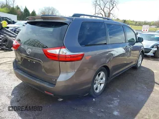 2015 Toyota Sienna LE AAS with VIN 5TDKK3DC5FS575077, listed as a IAAI auction lot 41941483 with 134,265 mi miles. Bid and sale history available at carsss.com. Image 4.