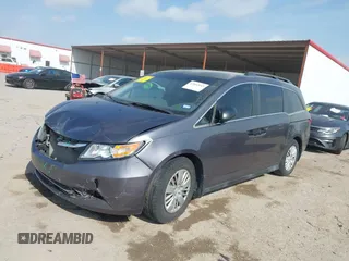2015 Honda Odyssey LX with VIN 5FNRL5H29FB032327, listed as a IAAI auction lot 42052043 with 153,365 mi miles and . Bid and sale history available at DreamBid. Image 17.